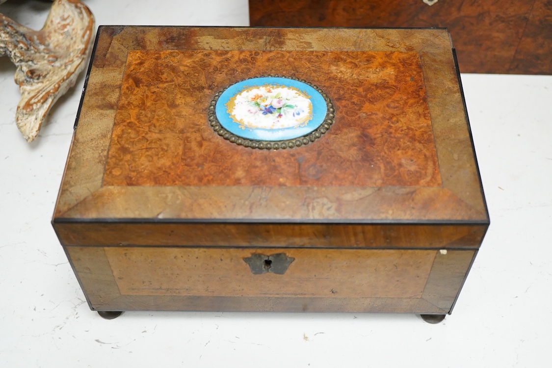 A 19th century burr walnut work box and a French burr wood and Sevres style porcelain mounted work box, 30.5cm wide x 14cm high.